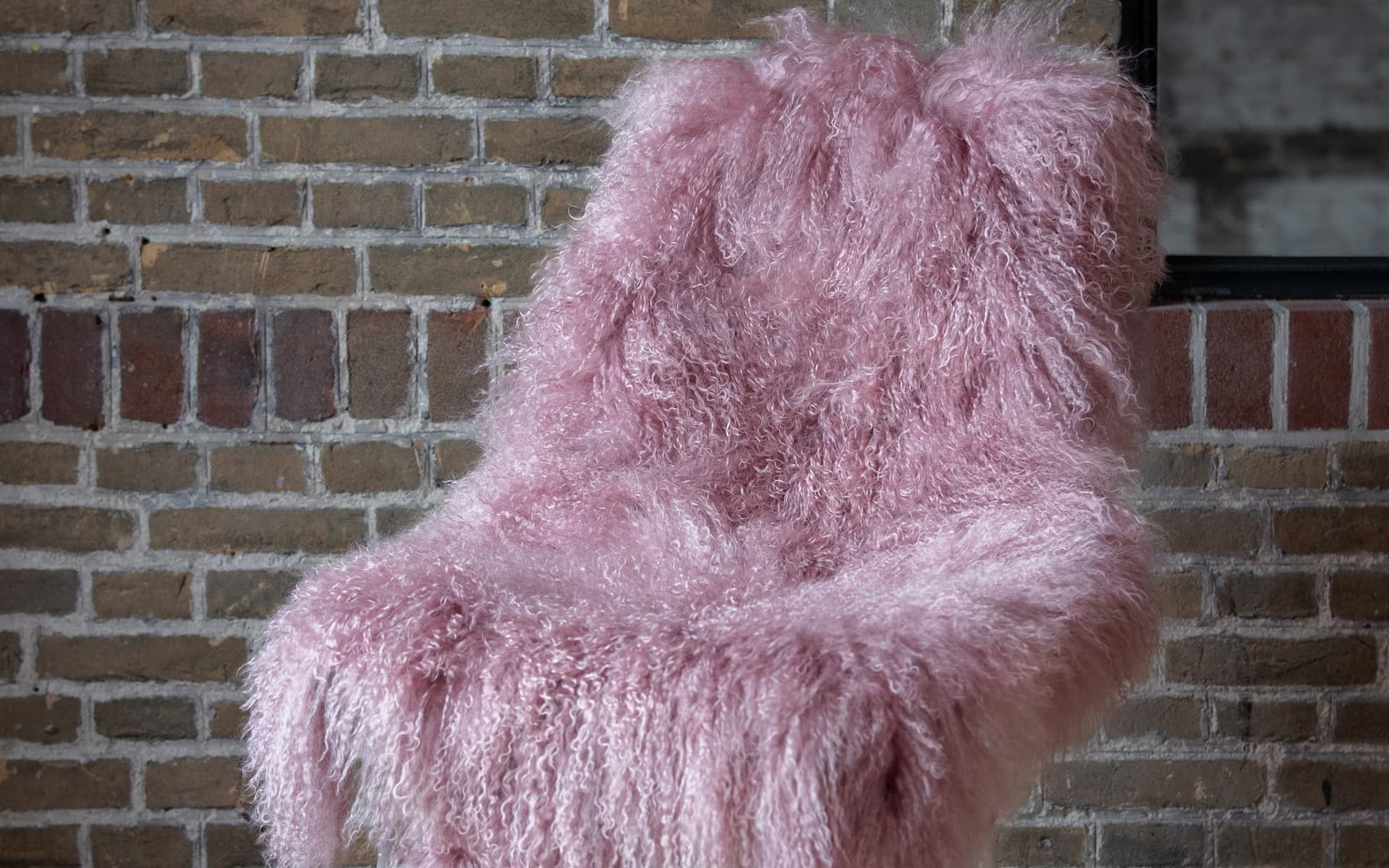 Tibet schapenvacht pink