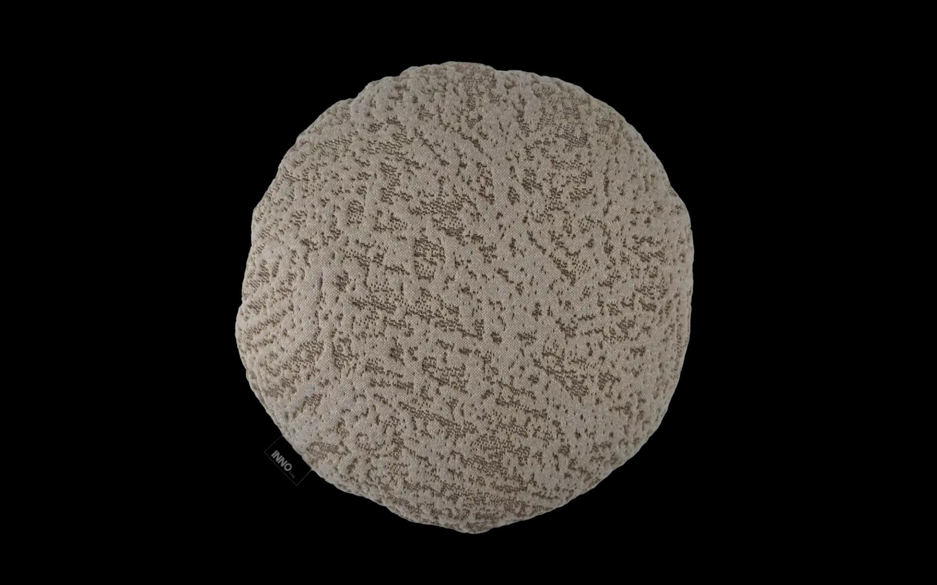 Voorzijde van het Beige rond sierkussen Tessura