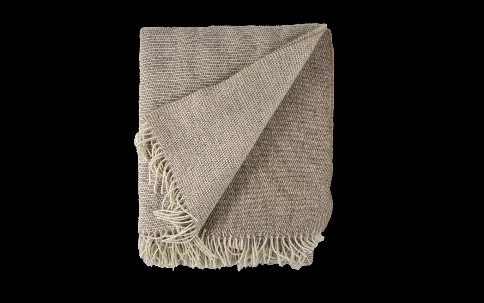 Luxe merino wollen plaid 200 x 145 cm zandkleurig, open gespreid met zichtbare textuur